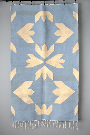 Bloom blue wool kilim accent rug by Yuba Mercantile
