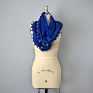 Blue pom pom infinity scarf by Yuba Mercantile