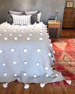 Gray and White Moroccan Cotton Pom Pom Blanket by Yuba Mercantile