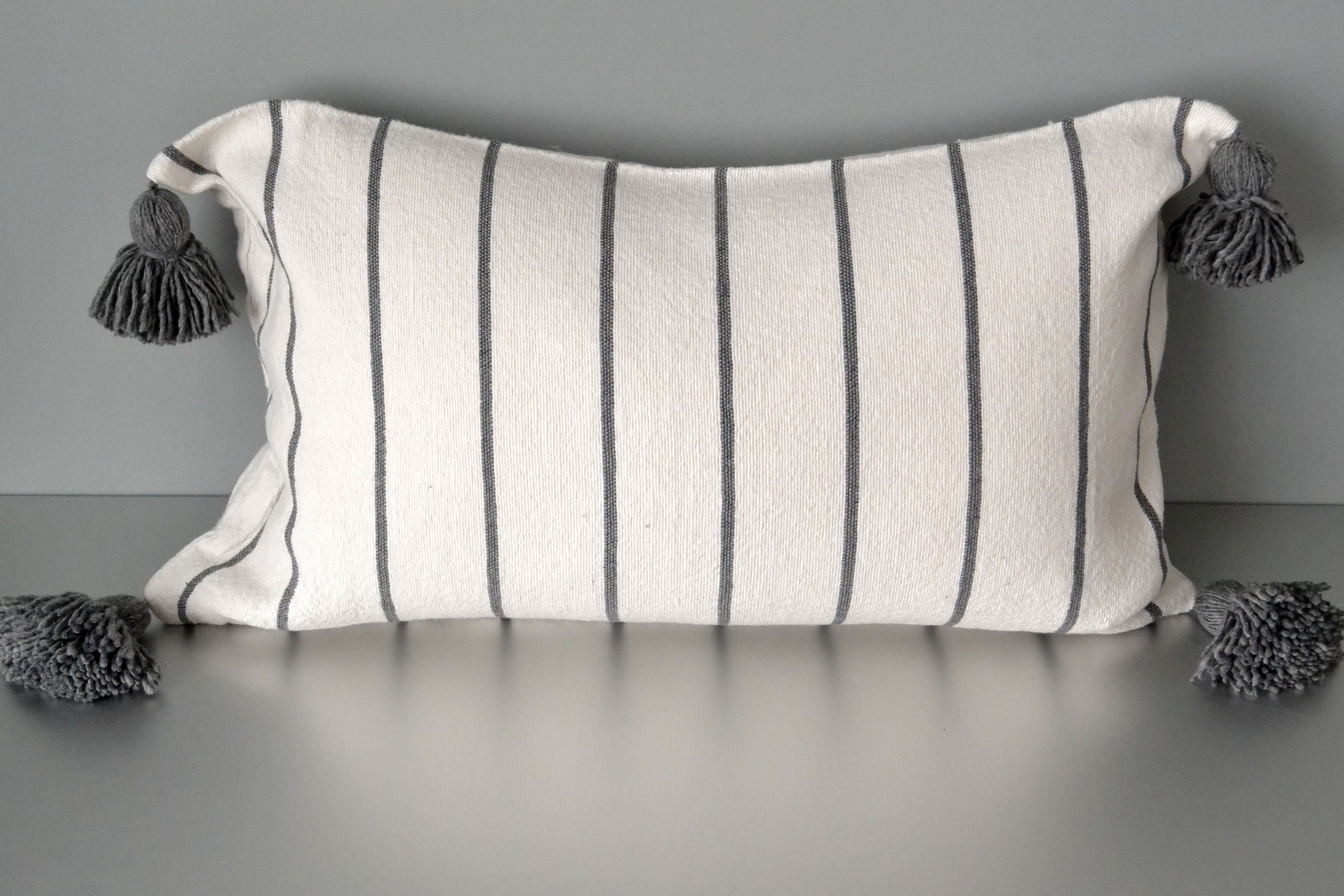 Steel Gray Striped Pom Pom Lumbar Pillow by Yuba Mercantile