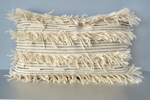 White fringe wool lumbar pillow by Yuba Mercantile