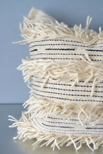 White fringe wool throw pillow closeup by Yuba Mercantile